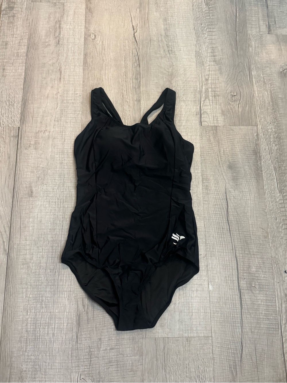 Sleek Black One-Piece Swimsuit with Subtle Side Logo